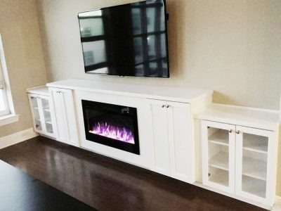 custom built cabinet with fireplace