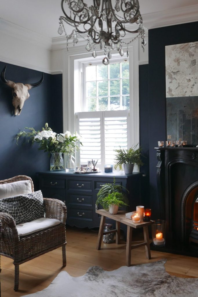 Blue Moody Family room with Detailed Fireplace 